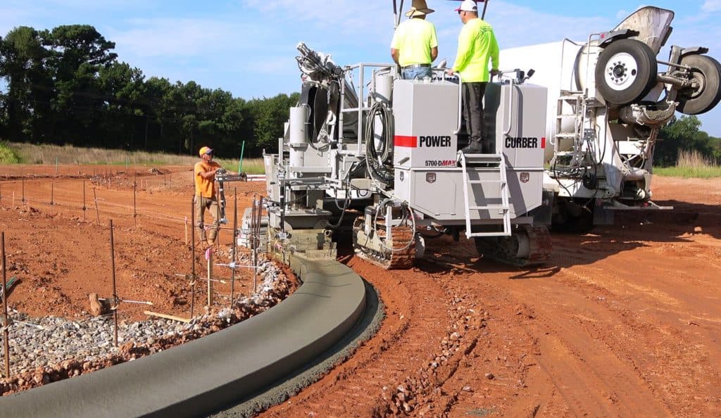 https://ynubnujbowecahoxvuzt.supabase.co/storage/v1/object/public/images/Power-Curber-5700-D-Slipform-Machine-Rollcurb-Curve-e1576869228792-1024x594.jpg
